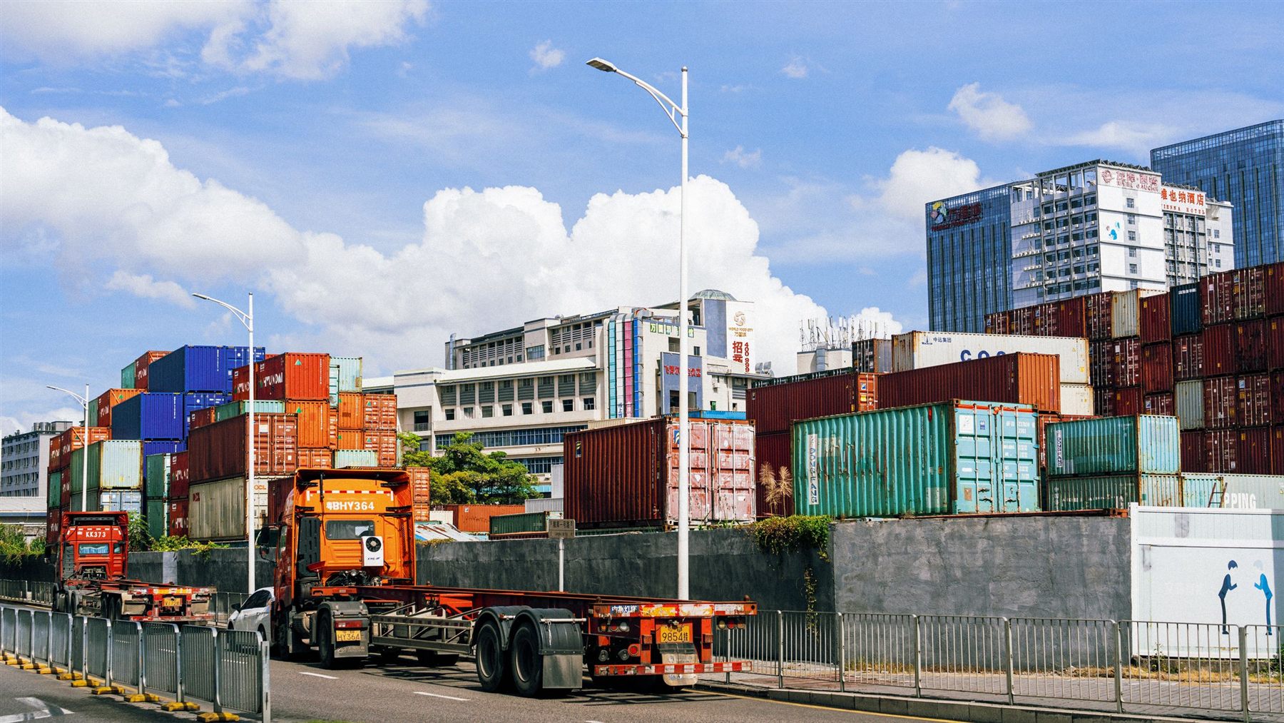 Delivery truck at a container logistics facility